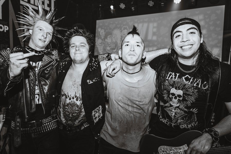 Noogy after their set, arms around each other